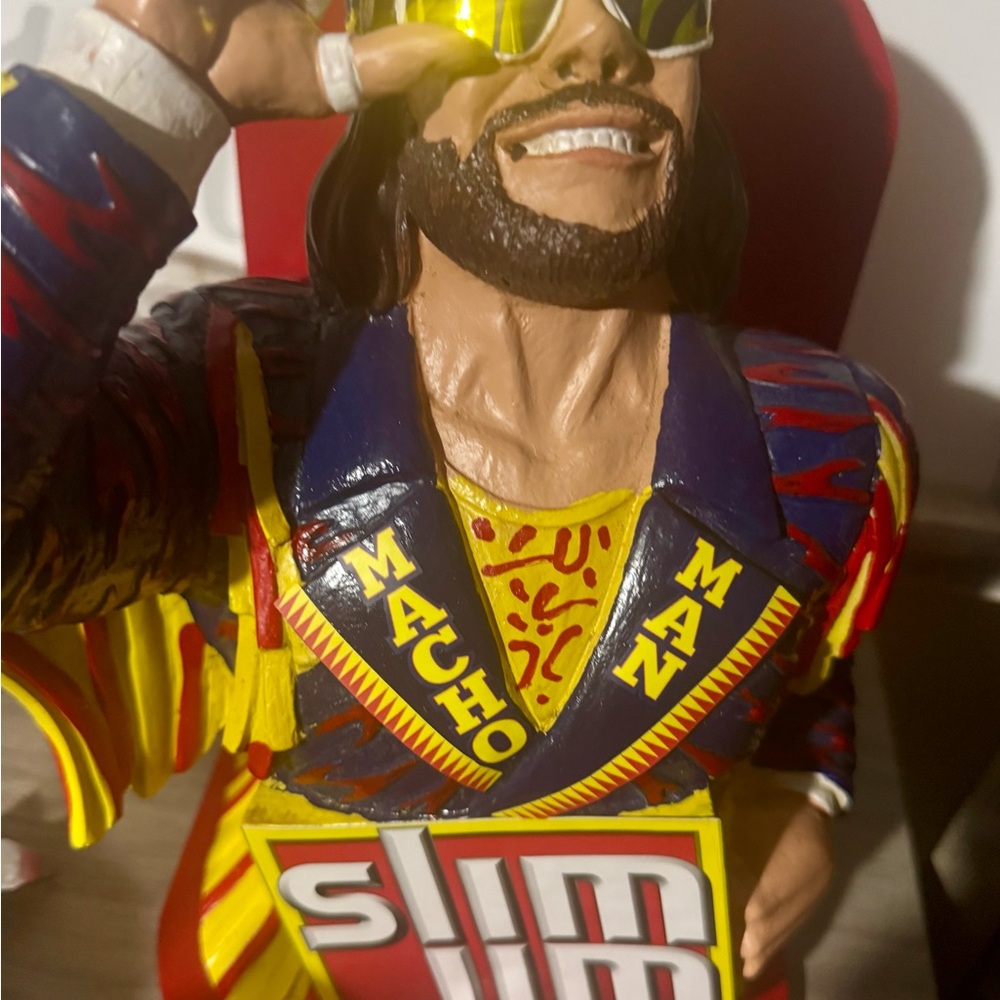 Vibrant Macho Man Figurine with Yellow and Blue Details